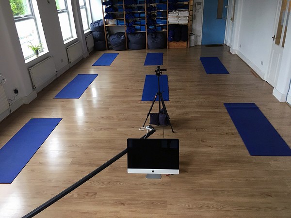The Yoga Rooms Studio with yoga mats and online broadcast equipment